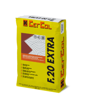 F.20 EXTRA BIANCO (25Kg) - Adesivo monocomponente al quarzo a legante misto, tempo aperto maggiorato, scivolamento verticale nullo, a base di cementi PTL 52,5R ed additivi speciali.